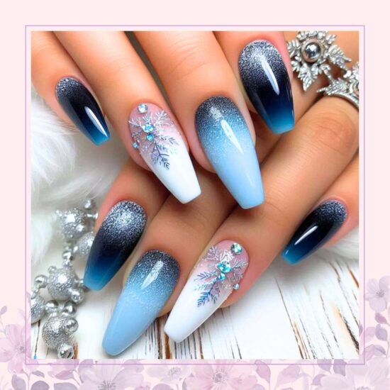 Blue ombre with crystal snowflakes nail design