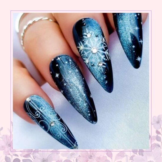 Dark blue galaxy with snowflakes nail design