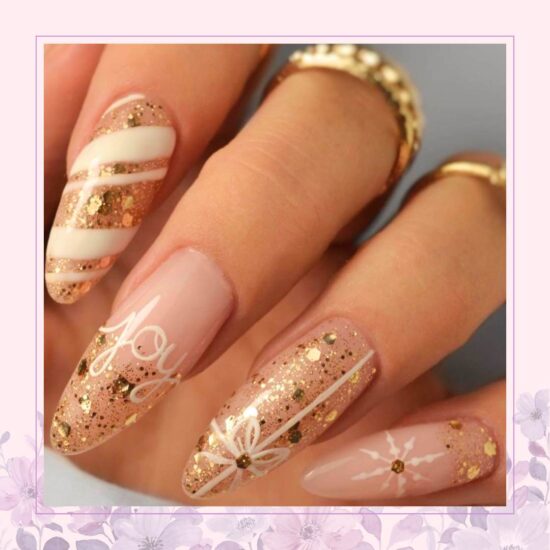 Joy lettering with gold accents nail design