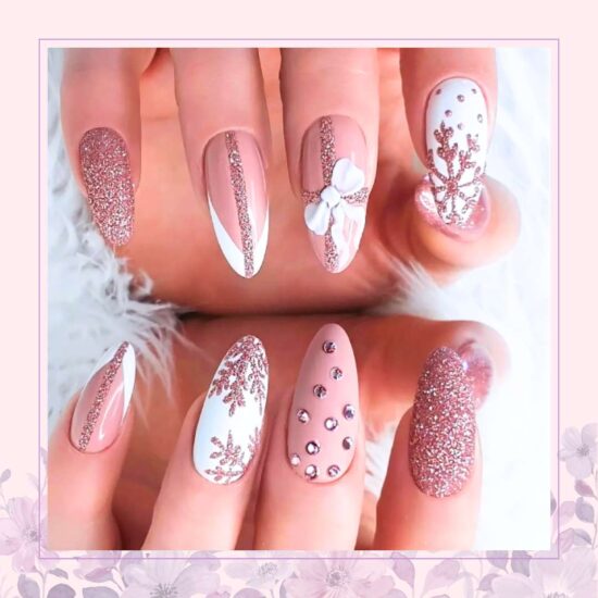 Pink and white nail art design with crystals