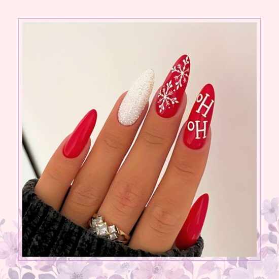 Red nails with HO HO text nail art