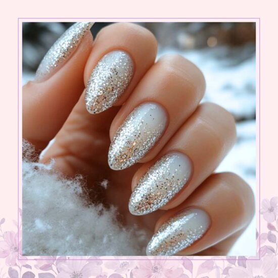 White base with silver glitter gradient nail design